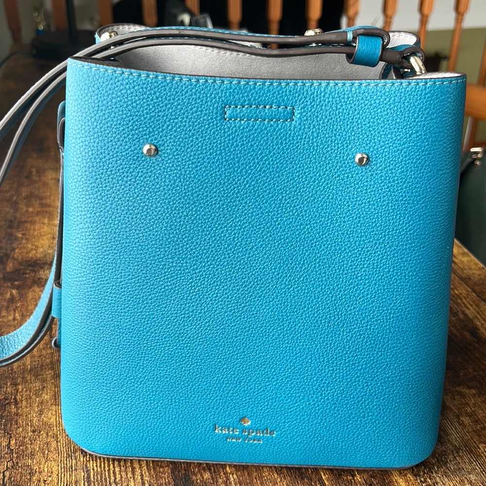 Kate Spade medium, single strap summer-blue shoulder bag.